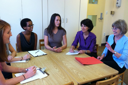 Graduate students meet to plan a group session with Clinic Director Betsy Micucci and Diirector of the Group Language Therapy Program, Dorry Brown
